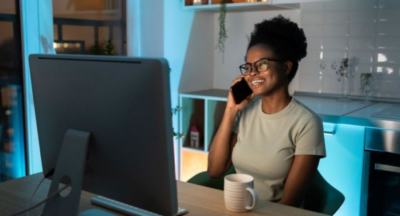  Woman sitting and talking on the phone