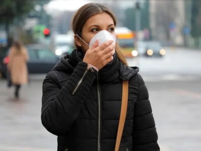 Woman Wearing a Face mask outside