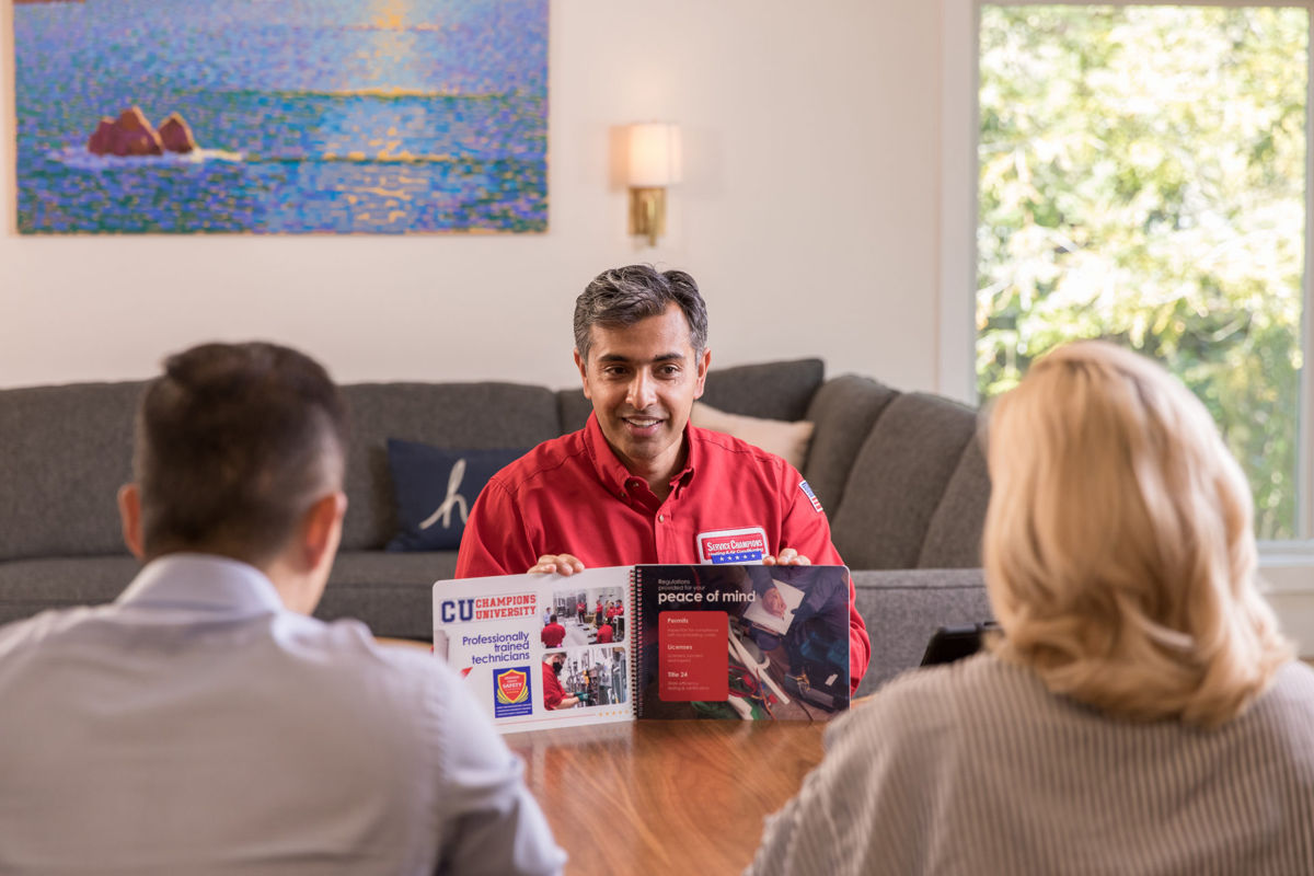 Service Technician explaining the customer