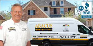 Abacus Technician standing in front of van