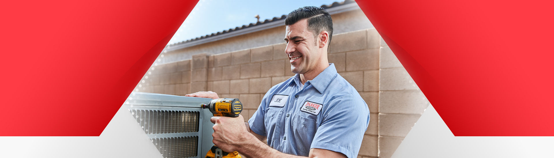 AC tech from Parker & Sons repairing an air conditioning unit