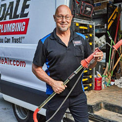 A Ragsdale plumber getting ready to clear a drain in Lawrenceville