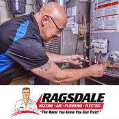 Plumber repairing a water heater