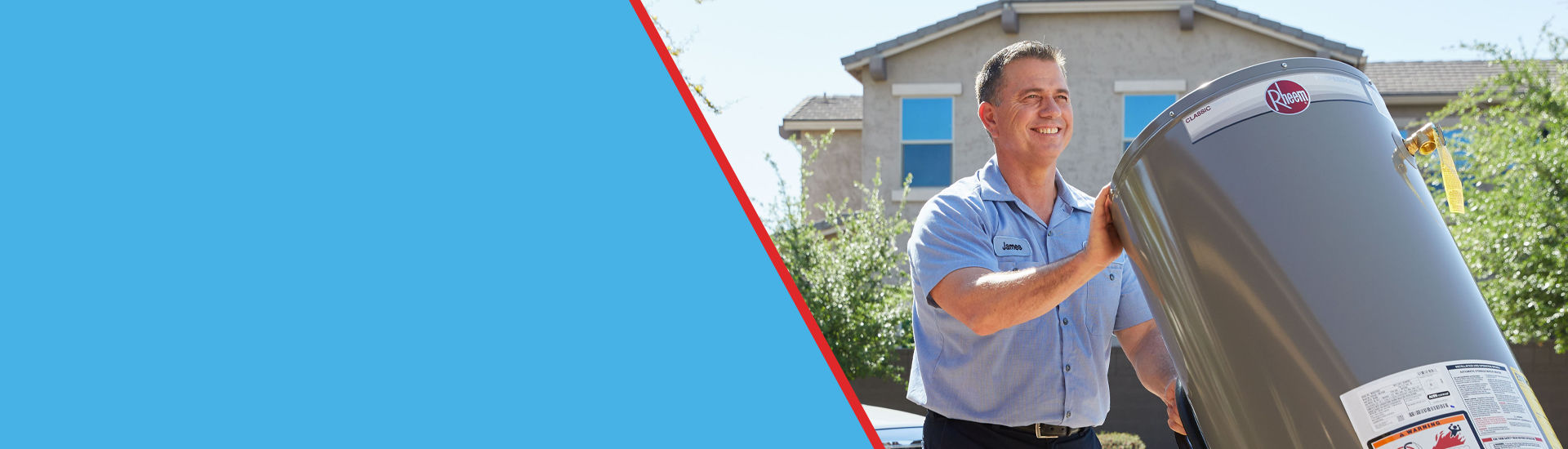 A smiling HVAC contractor moving equipment outside.