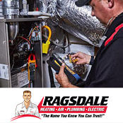 Ragsdale HVAC tech checking a system