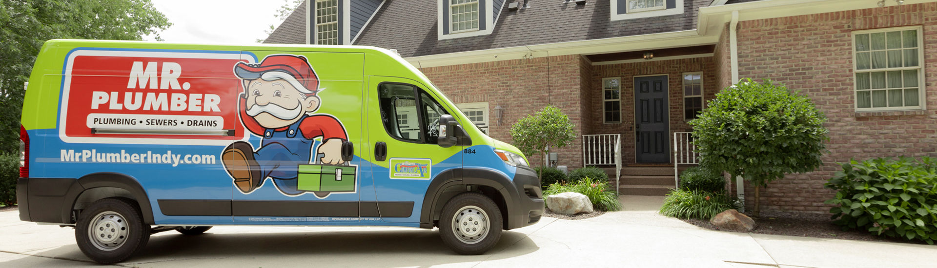 Mr. Plumber Indy truck wrapped with logo