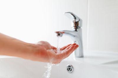 Water from a bathroom faucet